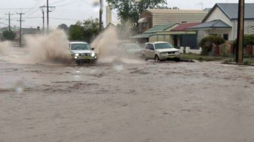 Broken Hill inundated with month's worth of rain in 15 minutes.
