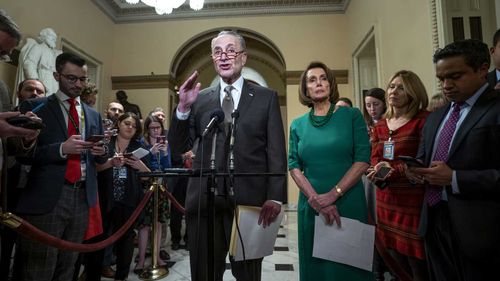 Democratic leaders Chuck Schumer and Nancy Pelosi speak to the press.