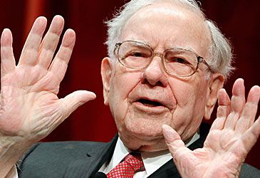What is the name of Warren Buffett's holding company?