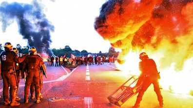 <p>French police have clashed with rioters over a controversial labour law change that would make it easier for bosses to hire and fire workers. </p>
<p>&nbsp;The country's government has pushed the controversial law through parliament, prompting a union backlash with protesters blocking oil refineries and causing a nationwide fuel shortage.&nbsp;</p>
<p>These photos were taken at Douchy-les-Mines as police attempted to dismantle a blockade at the entrance to a refinery near the Belgian border. </p>
<p>&nbsp;(All photos AFP)</p>