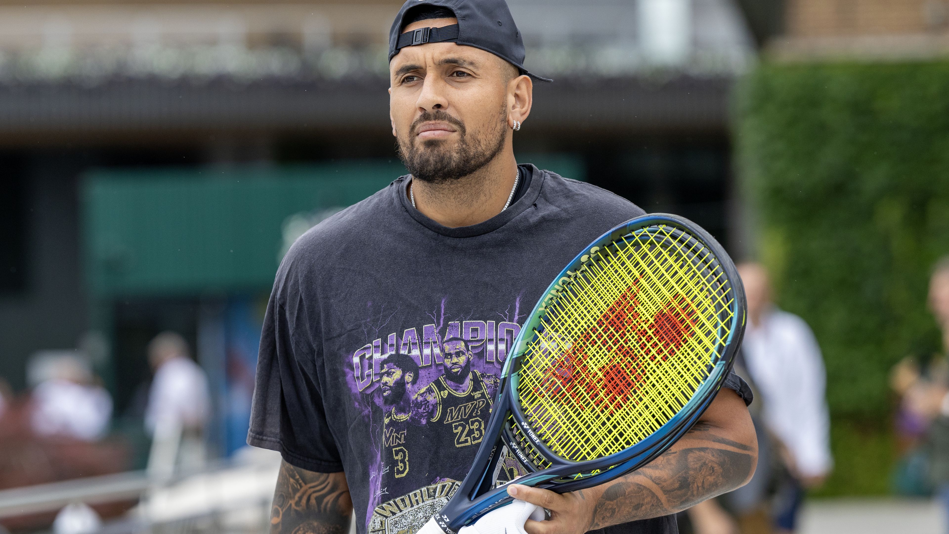 LONDON, ENGLAND - JUNE 30.  Nick Kyrgios of Australia heads for training on the practice courts in preparation for the Wimbledon Lawn Tennis Championships at the All England Lawn Tennis and Croquet Club at Wimbledon on June 30, 2023, in London, England. (Photo by Tim Clayton/Corbis via Getty Images)