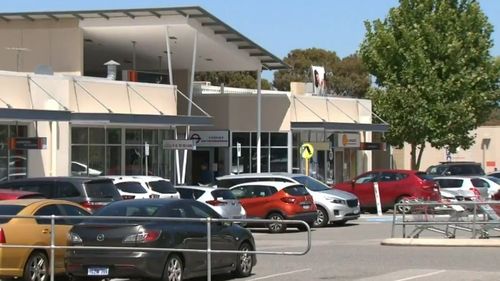 Diane Miller, 30, is in intensive care after a teenager allegedly threw a piece of concrete at her during an unprovoked melee at Waterford Plaza Shopping Centre carpark in Karawara.