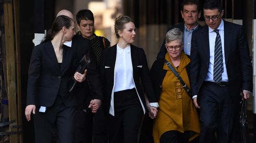 Actor Eryn Jean Norvill (centre) arrives at the Federal Court in Sydney, Wednesday, October, 31, 2018. 