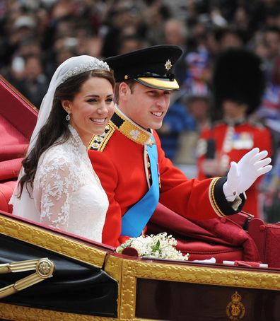 Prince William, Duke of Cambridge and Catherine, Duchess of Cambridge wearing the Cartier Halo tiara depart Westminster Abbey after there marriage on April 29, 2011 in London, England. 