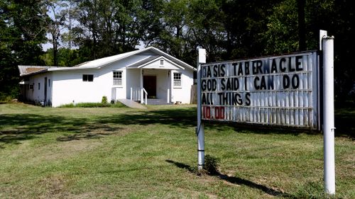 Man arrested after three shot inside Alabama church