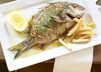 <a href="http://kitchen.nine.com.au/2016/05/17/14/23/whole-sea-bream-with-herb-butter" target="_top">Neil Perry's whole sea bream with herb butter and hand-cut chips</a>