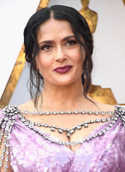 <p>Salma Hayek made waves for all the right reasons. The actress, 50, embraced her natural hair and let her grey streaks shine through in a low bun. Hayek paired her low-key hair with a deep rouge-noir lipstick  to contrast her lavender dress.</p>