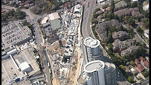 A bricklayer has been seriously injured after falling eight metres through a hole at a Sydney construction site.