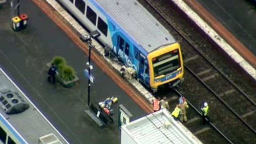 A car has been hit by a train at Surrey Hills station. (9NEWS)