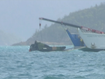 The wreckage of what is believed to an MRH-90 Taipan in Whitsunday waters. Search and rescue crews have found debris in the search for four Australian defence helicopter crew who are feared dead after their aircraft went down off Hamilton Island in Queensland late last night.