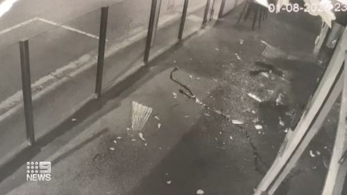 CCTV footage captured the moment the entire window caved in as shards of glass fell onto the rider.