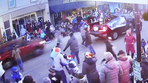 A video is shown of Jeff Rogers, who was walking in the parade with his children and baseball team, including 8-year-old Jackson Sparks who was killed in the parade, just before a SUV hits their team.