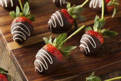 Four chocolate dipped strawberries = 164 calories