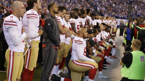 Some of the players took a knee during the national anthem.