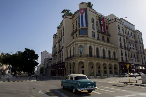 Cuba is going through its worst economic crisis in decades, along with a resurgence of coronavirus cases. (AP Photo/Ismael Francisco)