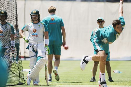 The Australian Cricket Test team practice at the SCG ahead of the Test in Sydney later this week. Batter Will Pucovski and bowler Patt Cummins. 