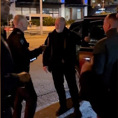 Kyle Sandilands ambushed by cops outside of studio