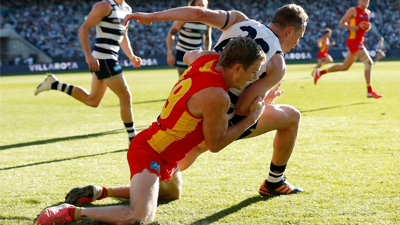 Holman tackles Duncan