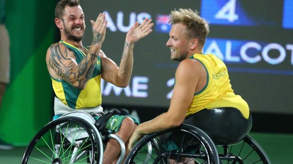 Dylan Alcott and Heath Davidson win Australia's first Paralympic gold medal in quad doubles wheelchair tennis.
