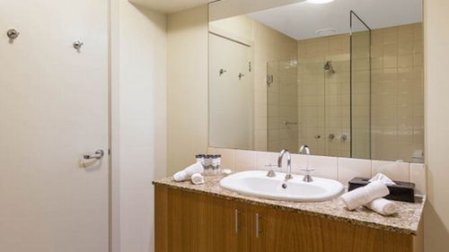 Photographs from the Oaks Hotel website show an example of a bathroom. (Oaks Hotel)