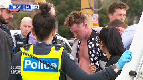 A young man stabbed to death in Melbourne's north has been hailed a hero for saving his mum's life during an alleged knife attack.