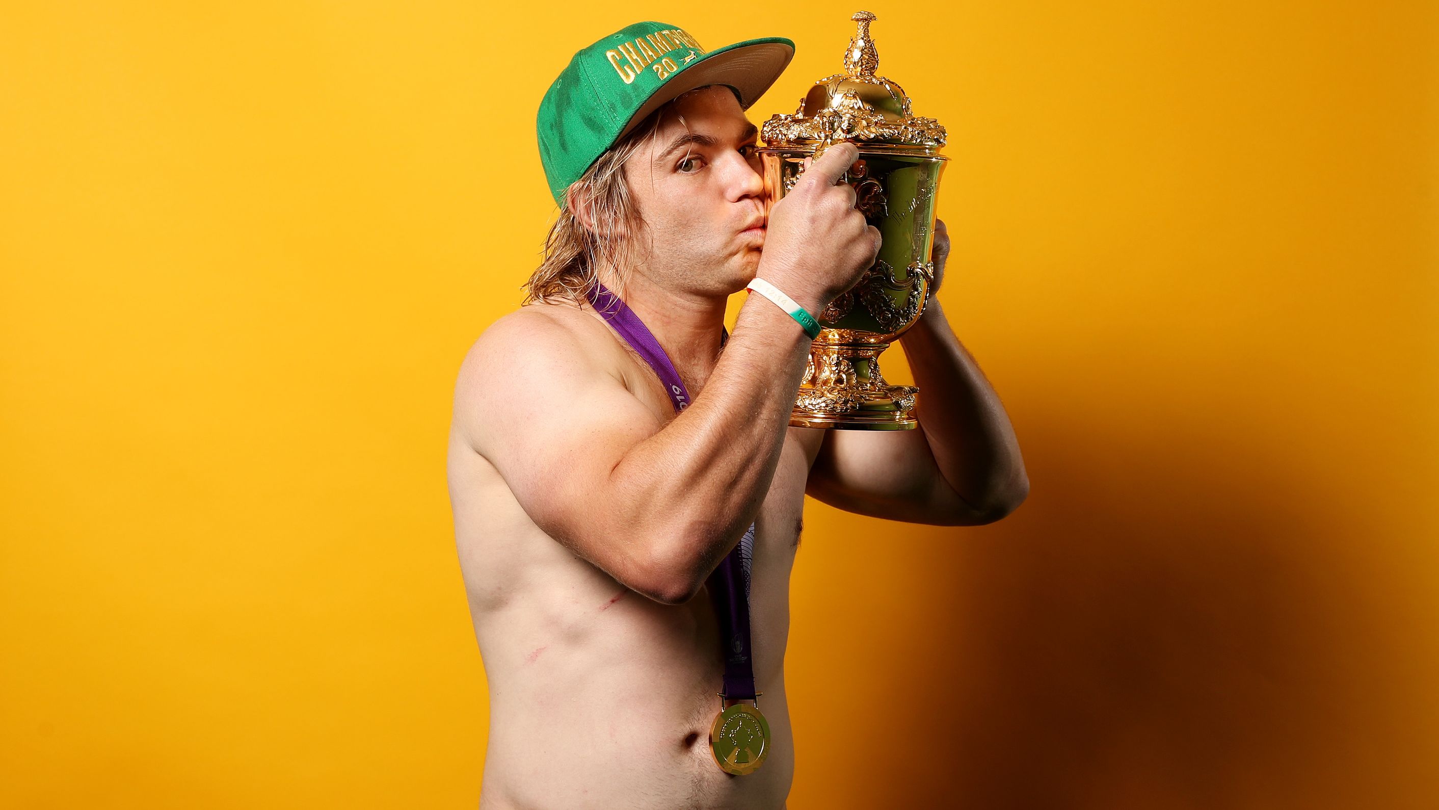 Faf de Klerk poses with the 2019 Rugby World Cup.