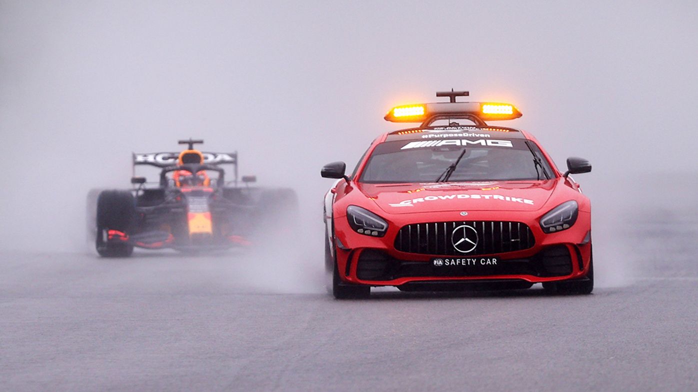 The safety car leads Max Verstappen at the Belgian Grand Prix.