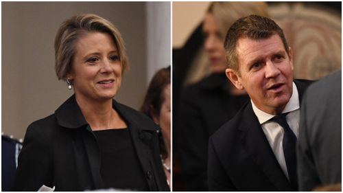 Former rivals and NSW premiers Mike Baird and Kristina Keneally arrived together. (AAP)