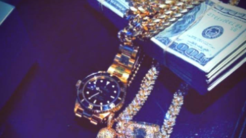 The men shared images of watches, cars and money. (Instagram)