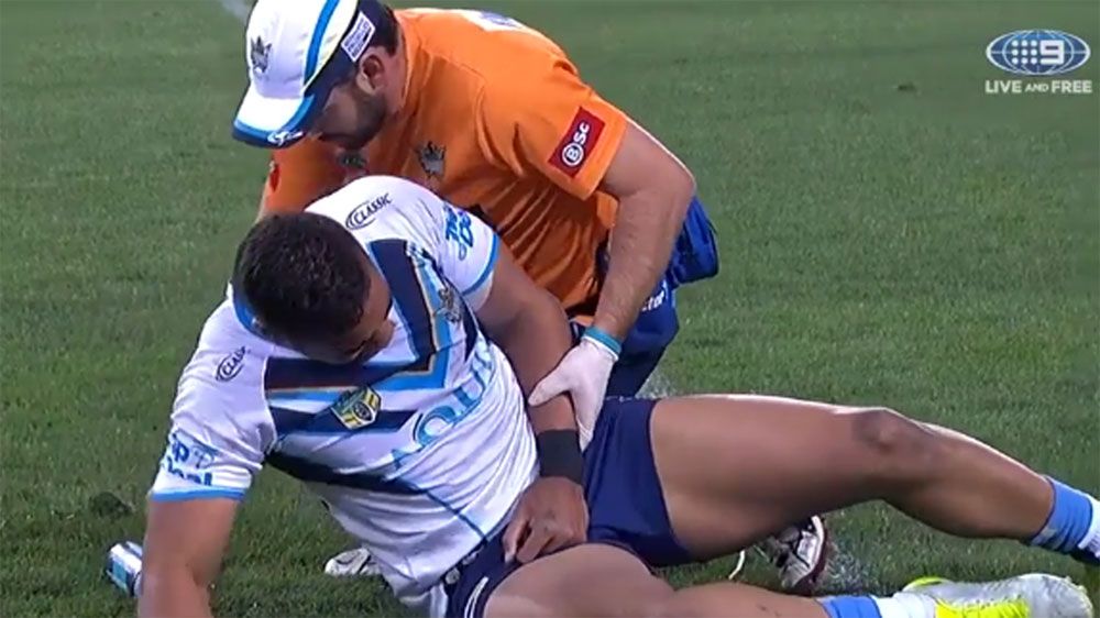 Gold Coast Titans forward John Olive suffers a dislocated elbow in loss to Parramatta Eels
