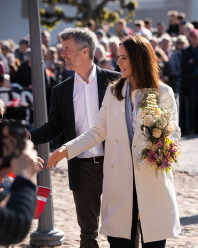 FREDENSBORG, DENMARK - MAY 5: King Frederik X of Denmark and Queen Mary of Denmark are welcomed by the public at Fredensborg Castle on May 5, 2025 in Fredensborg, Denmark. (Photo by Martin Sylvest Andersen/Getty Images)