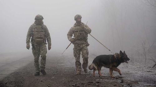 Ukrainian soldiers guard an area near Odradivka, eastern Ukraine.