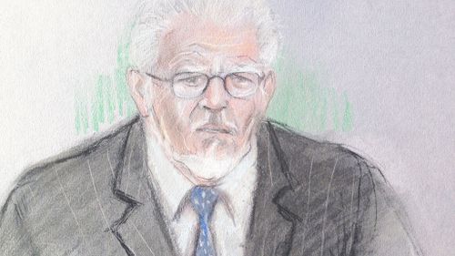 Woman denies claim she accused Rolf Harris of indecent assault for compensation