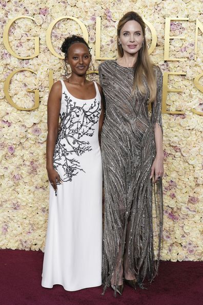 Zahara Jolie, left, and Angelina Jolie arrive at the 82nd Golden Globes on Sunday, Jan. 5, 2025, at the Beverly Hilton in Beverly Hills, Calif. 