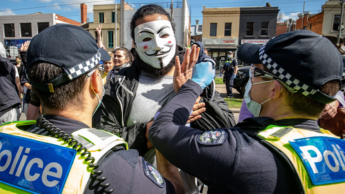 Protesters clash with Police at the Queen Victoria Market on September 13, 2020 in Melbourne, Australia. (Photo by Darrian Traynor)