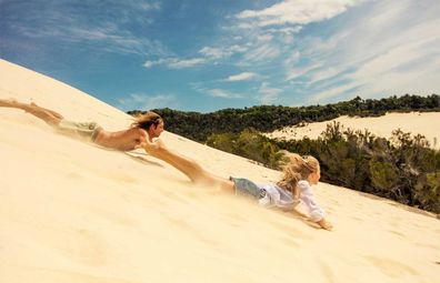 Tangalooma sand dune tabogganing