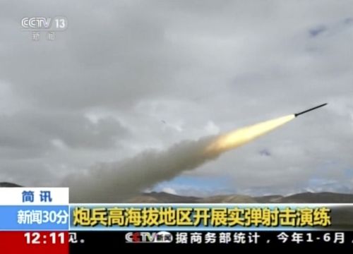 In this image taken from a recent video footage run by China's CCTV on Friday, Aug 4, 2017 via AP Video, a rocket is launched during a live-fire drill by the Chinese army in China's Tibet Autonomous Region that border India. Beijing is intensifying its warnings to Indian troops to get out of a contested region high in the Himalayas where China, India and Bhutan meet