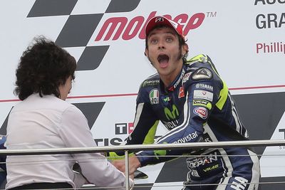 Rossi couldn't believe his luck after Marquez crashed out. (AAP)