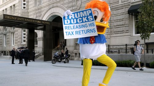 Donald Duck protester Trump International Hotel in Washington DC.