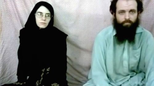 Caitlan Coleman and her husband, Canadian Joshua Boyle appear in a militant video given to their families. (AAP)