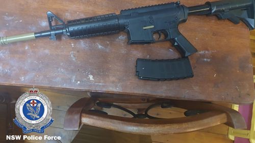 NSW Police seized weapons when arresting a man for allegedly threatening the state's Police Minister.