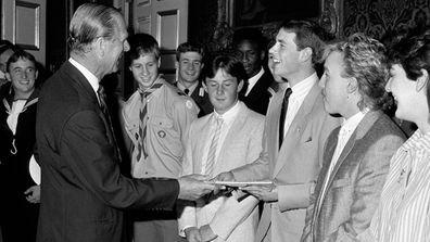Prince Philip giving Prince Edward his Duke of Edinburgh Gold Award in 1986