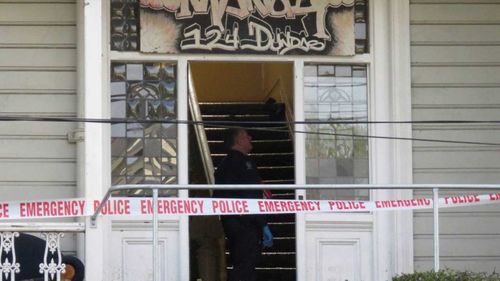 Police cordon off 'The Manor', the student house where a student was crushed to death.