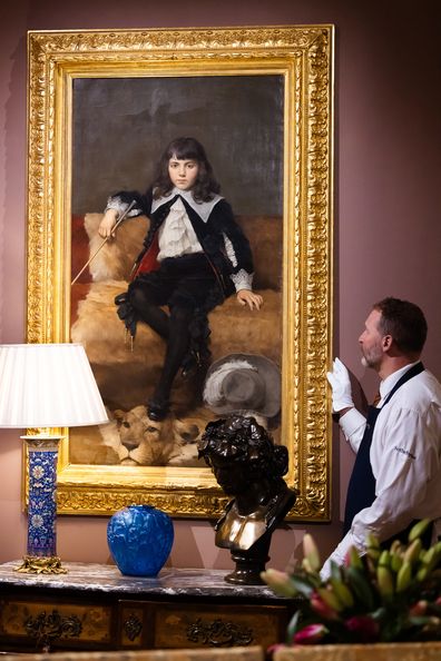 A painting 'Young Boy on a Sofa' by Geza Vastagh owned by Freddie Mercury on display at Sotheby's on August 03, 2023 in London, England.  
