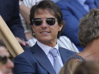 Film star Tom Cruise smiles sits in the Royal Box for the final of the women's singles between Tunisia's Ons Jabeur and Kazakhstan's Elena Rybakina on day thirteen of the Wimbledon tennis championships in London, Saturday, July 9, 2022