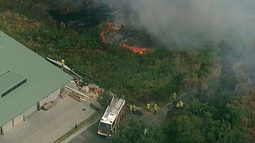 Firefighters work to control the blaze. (9NEWS choppercam)