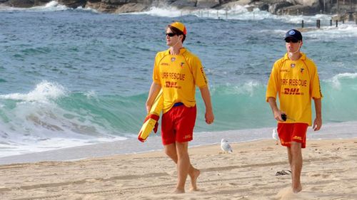 Lifesavers from four clubs were involved in the rescue at Forresters Beach, after police were called about three people in distress in the water

