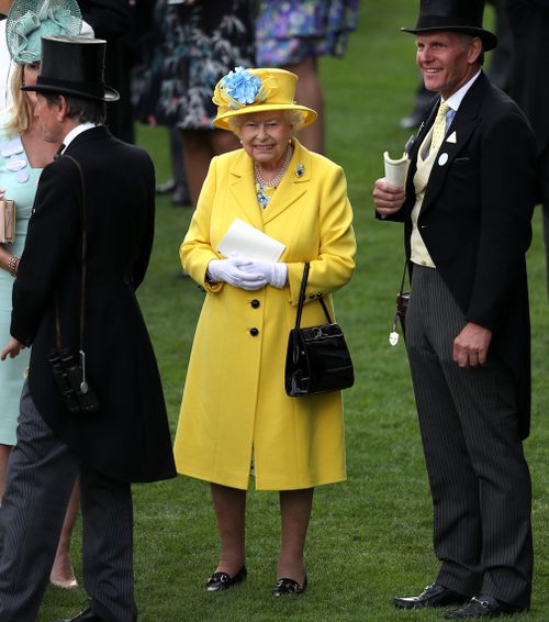 The Queen was resplendent in a yellow Angela Kelly ensemble. Picture: Getty