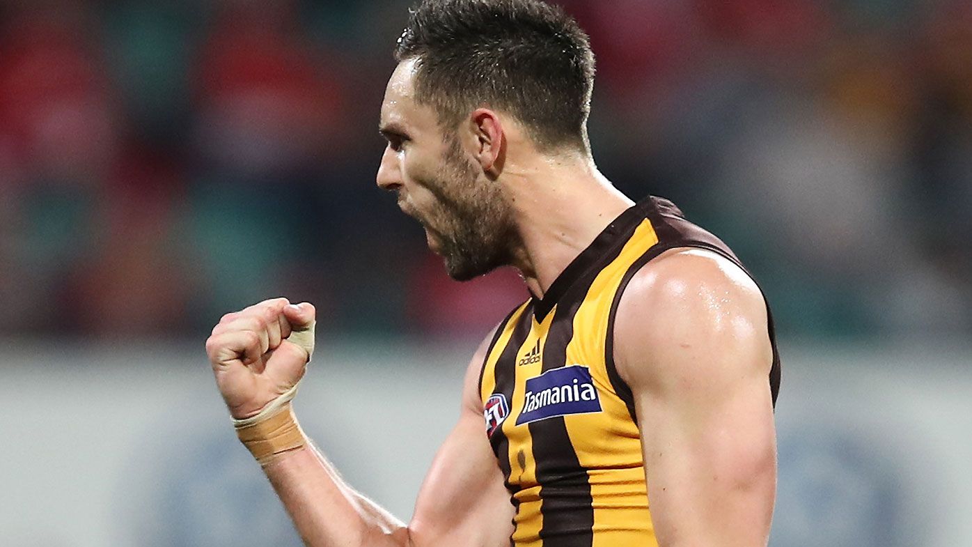 Hawks edge out Swans for top four AFL spot