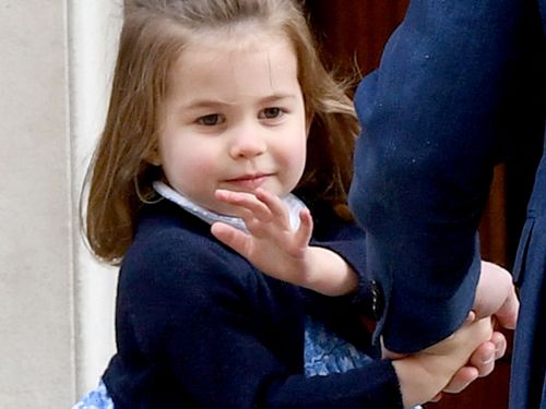 Princess Charlotte waves to the crowd. (PA/AAP)